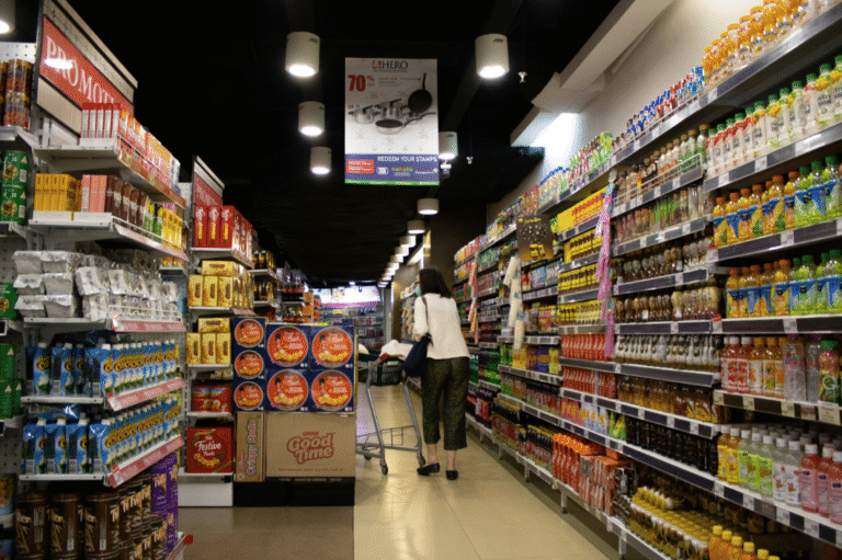 Gondola shelving in a retail store aisle displaying products in an organized, easy-to-browse layout.