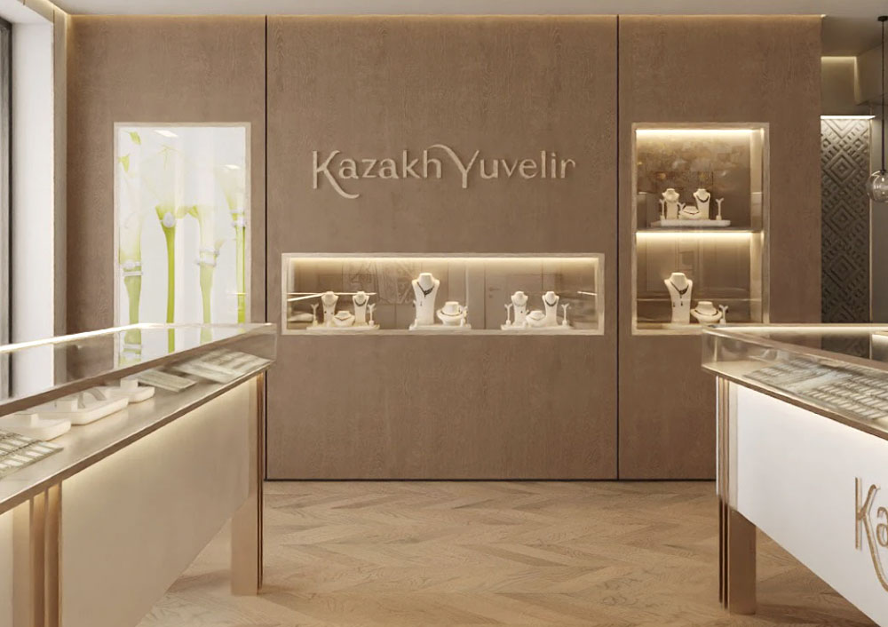 Interactive digital display screen showing jewelry catalog in a retail jewelry store environment