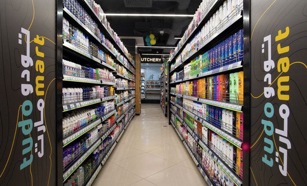 Retail color and material palette featuring primary brand colors, accent tones, and standardized fixture finishes.