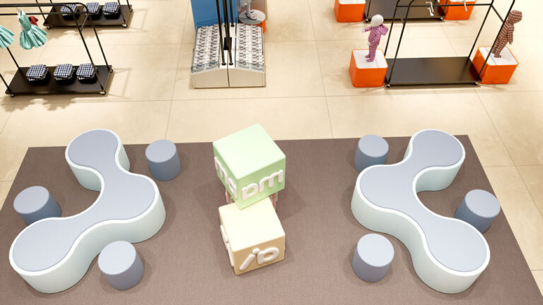 Kids shoe display area with neat shelving in clothing store