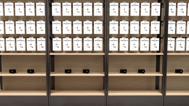 Digital accessory display wall with grid shelves for phone accessories