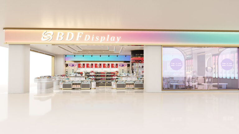 Cosmetic retail store right side exterior view, side facade with secondary entrance and themed display showcase window