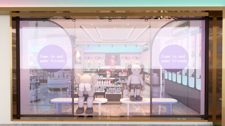 Cosmetic store entrance window display with themed beauty products