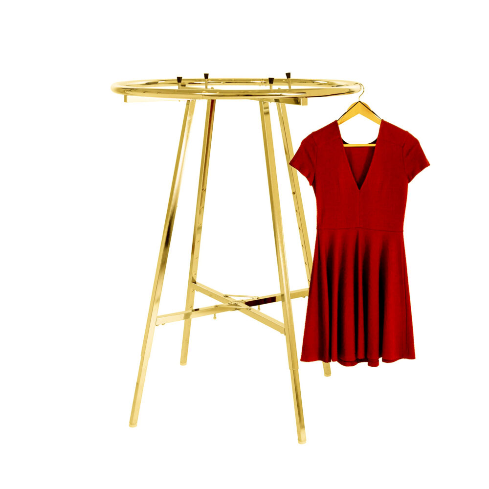 Three-quarter view of luxury electroplated gold round clothing display rack showing top glass shelf and circular hangrail.