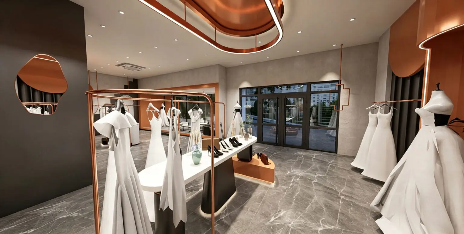 Modern bridal boutique interior featuring arched doorways, micro-cement walls, and custom rose gold dress racks.