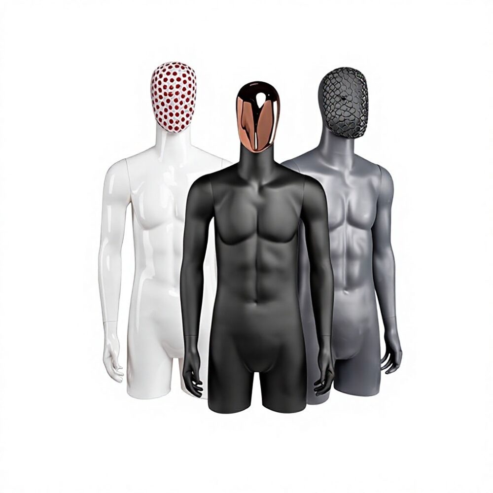 Wholesale male mannequin torsos in matte black, white, and grey with abstract designer faces