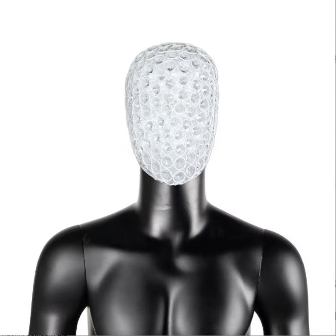Artistic black geometric mesh pattern face plate on half-body male mannequin torso