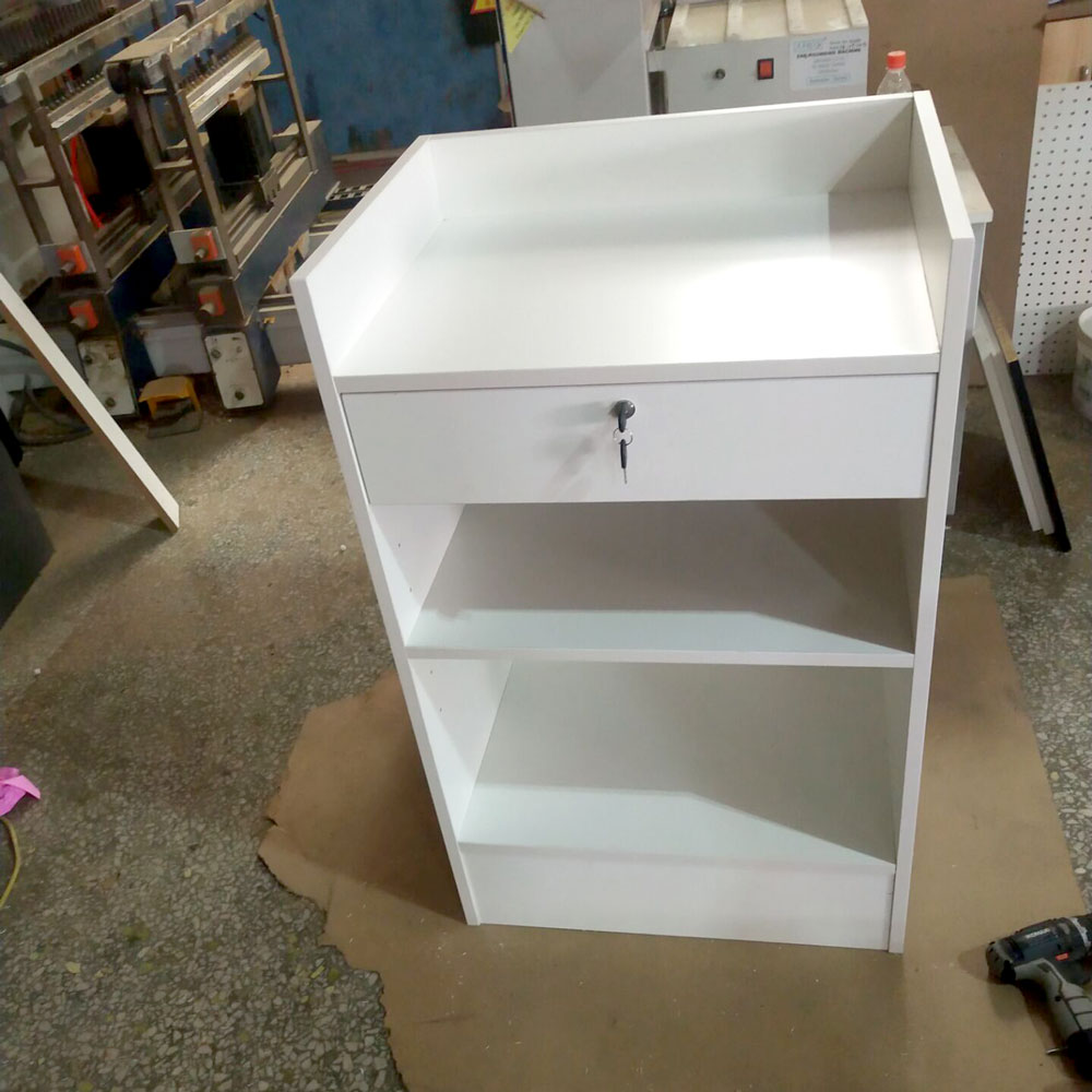 High-angle front view of white wooden register stand during factory assembly - SCRC2